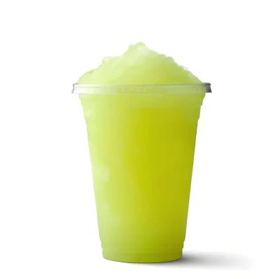 Monsterlush™ LemonTea Slush-Sirup mit veganem Zitronen-Eistee-Aroma und hellgrüner Farbe